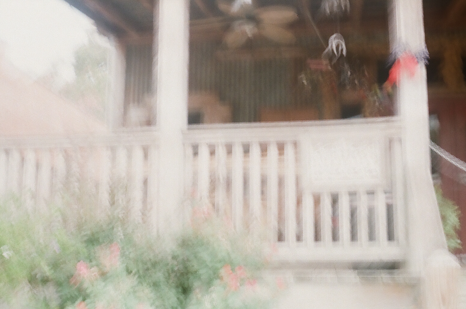 A blurry photo of a porch